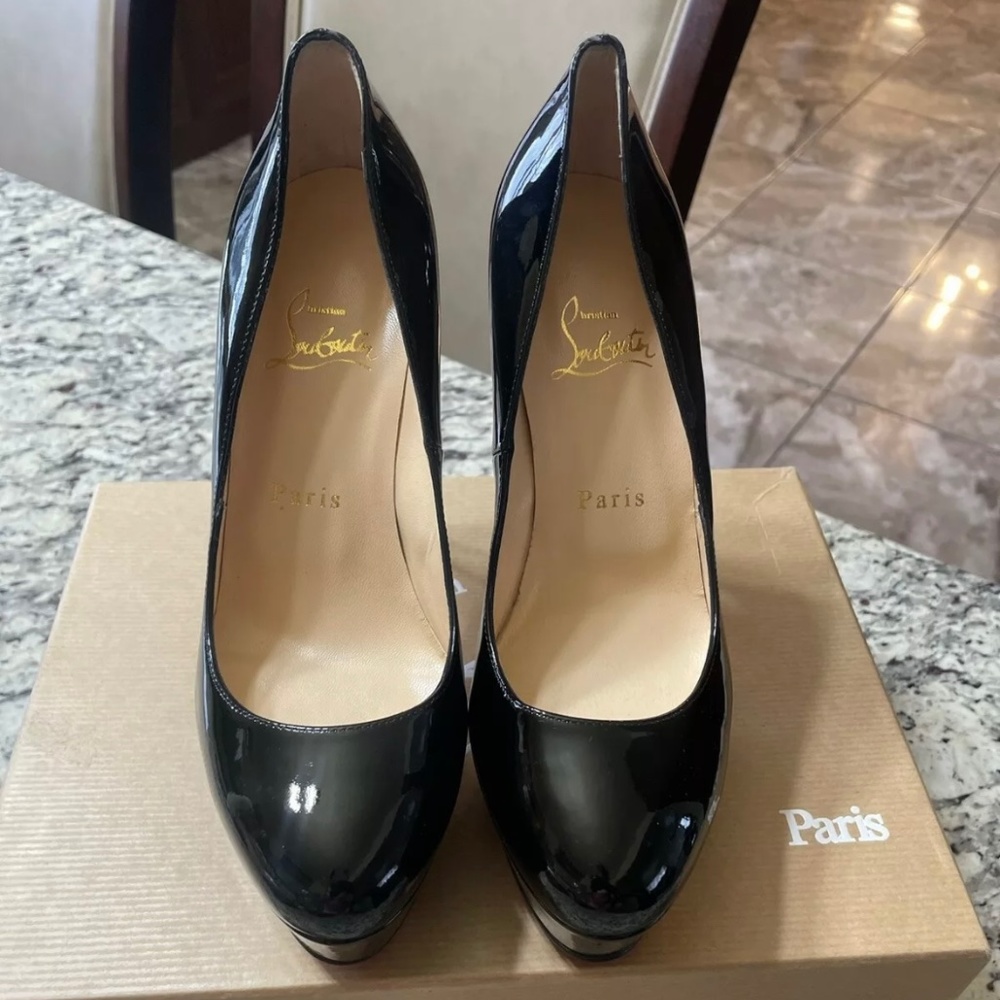 AUTHENTIC  christian louboutin patent leather heel.  100% AUTHENTIC. Never been